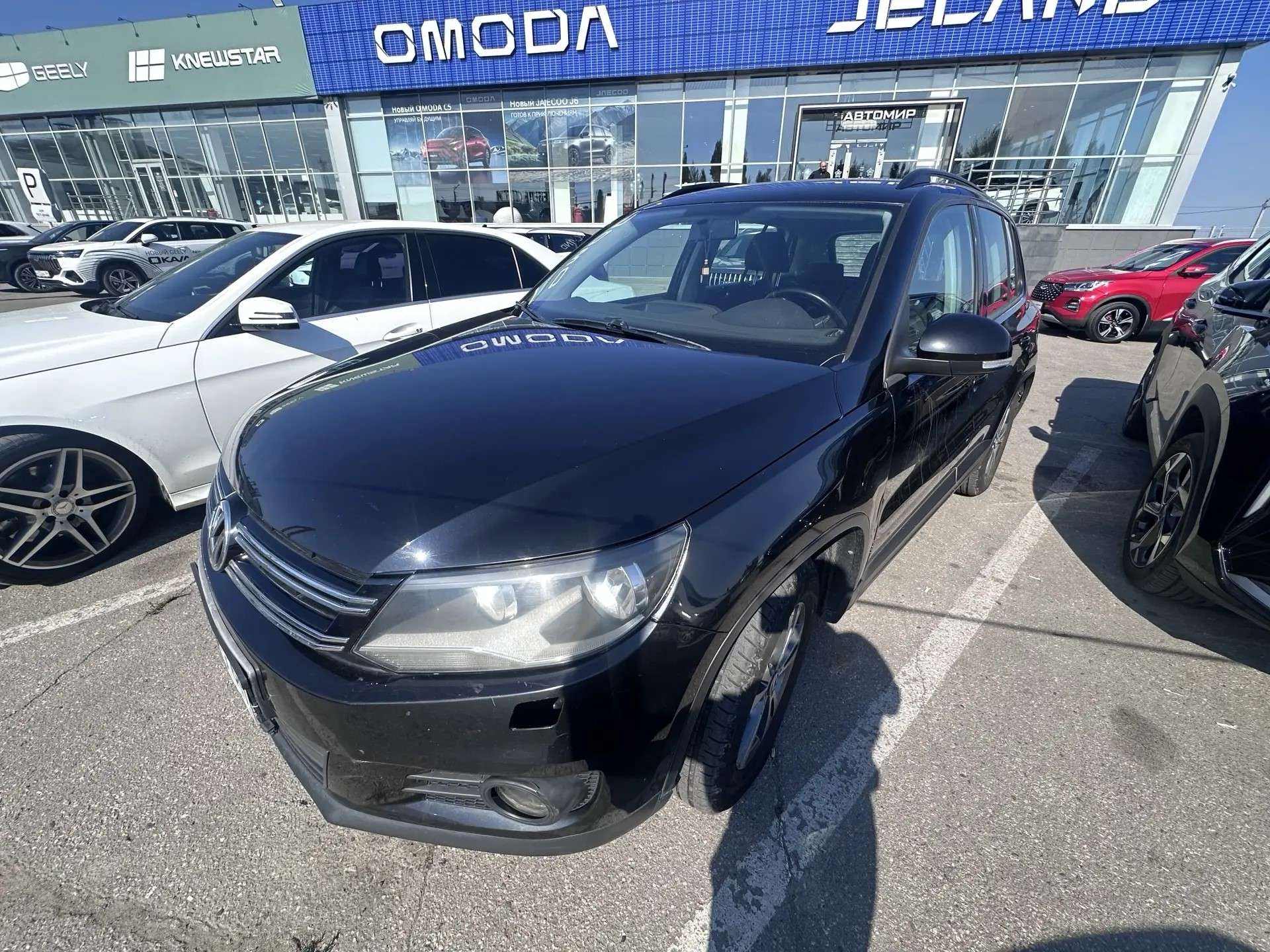 Volkswagen ТIGUАN, 2012 — Снаружи
