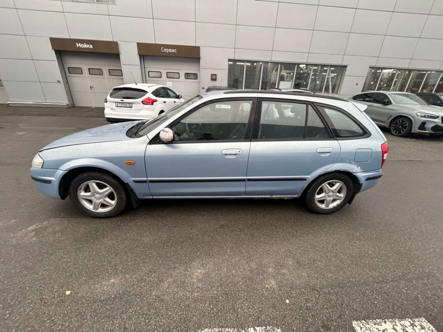 Mazda 323, 1999 — Снаружи