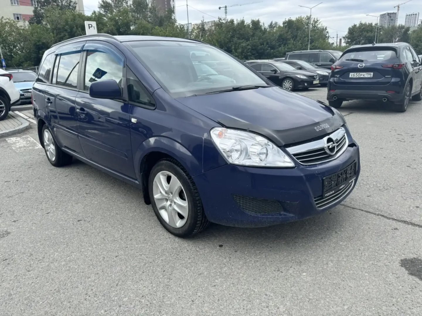 Opel Zafira, 2011 — обложка