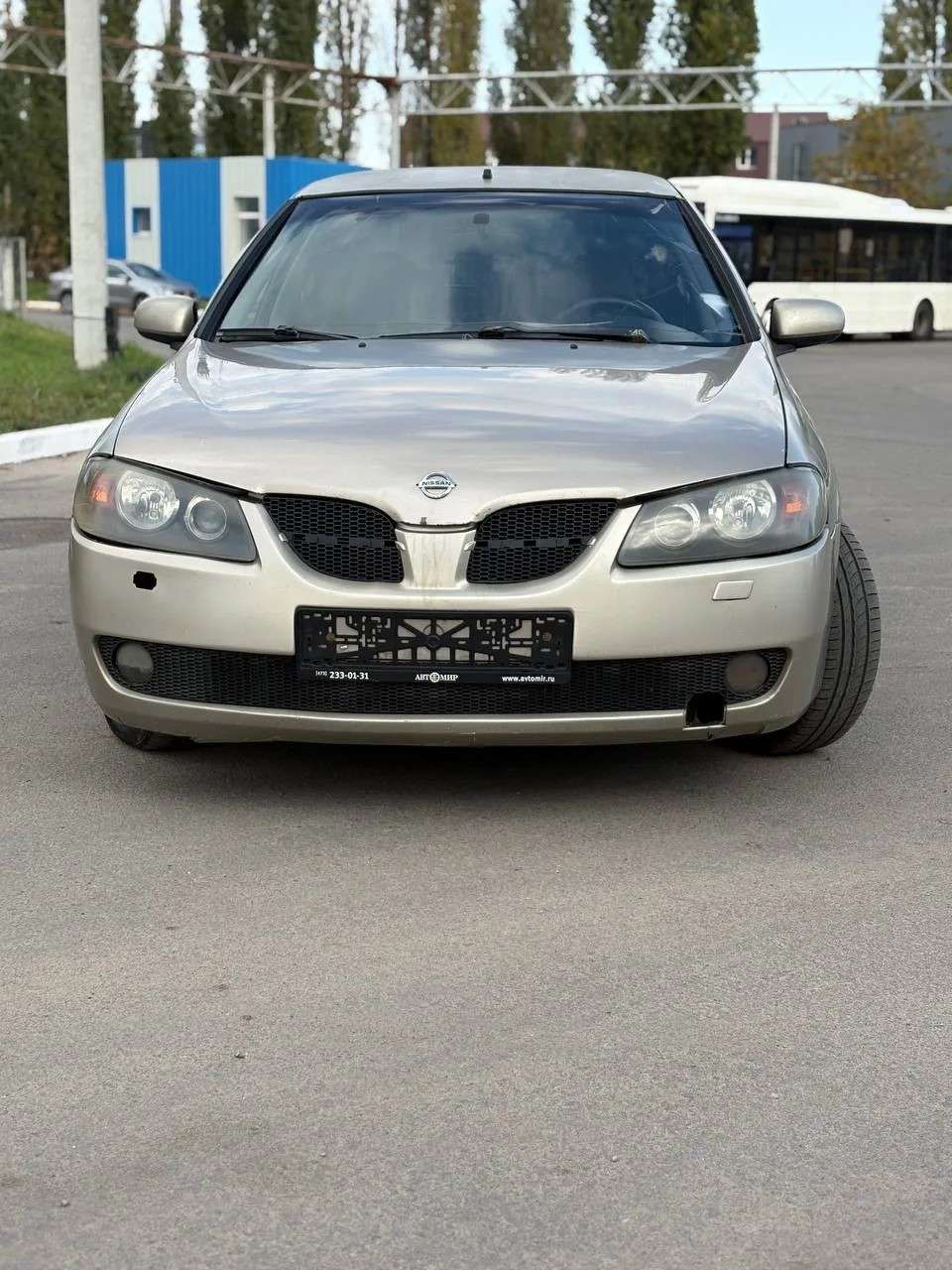 Nissan Almera, 2003 — обложка