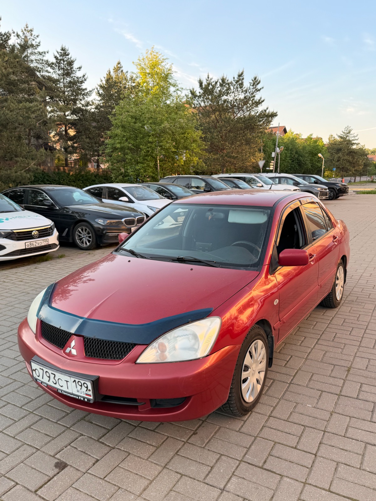Mitsubishi LANCER, 2009 — обложка