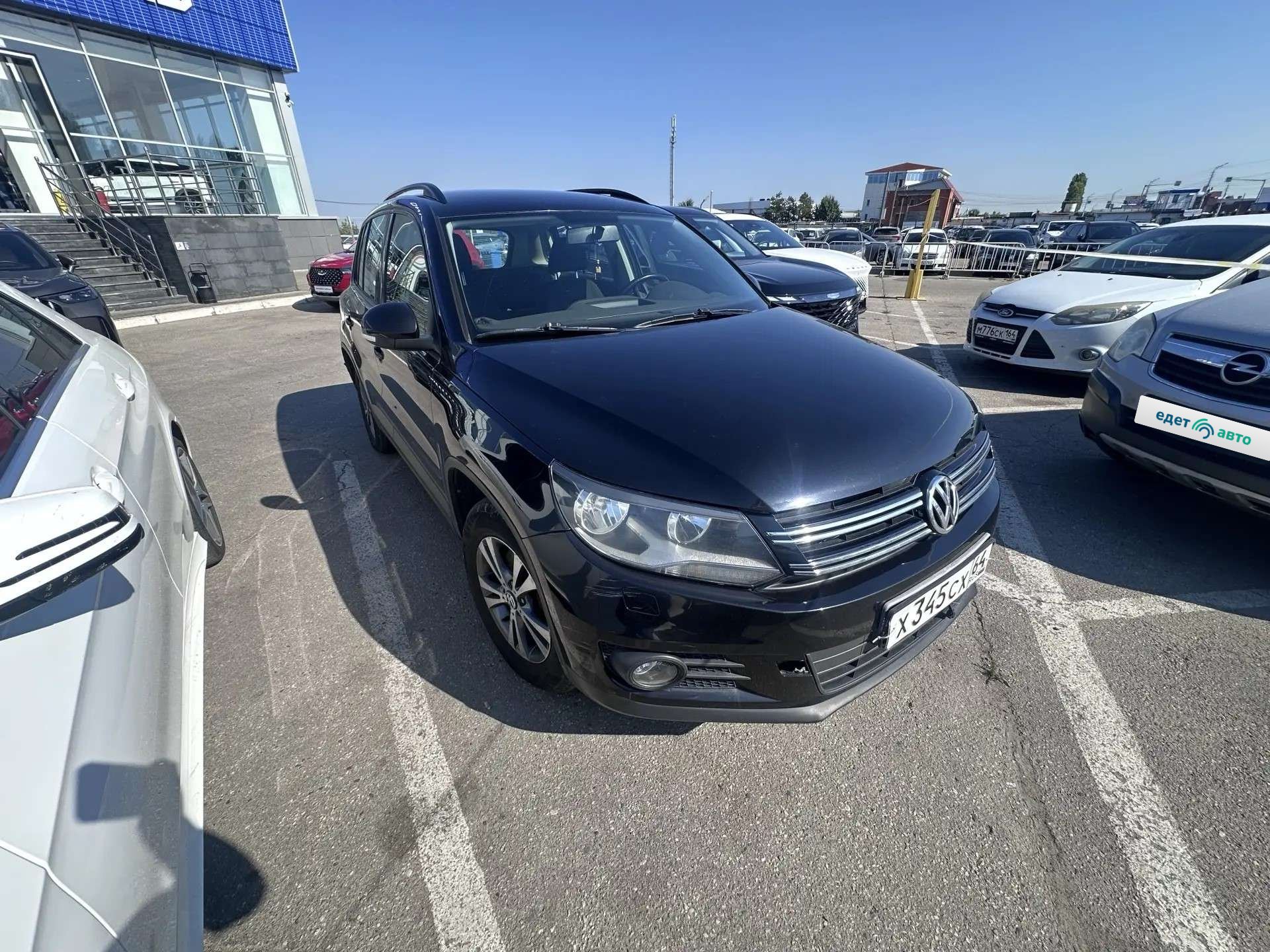 Volkswagen ТIGUАN, 2012 — Снаружи