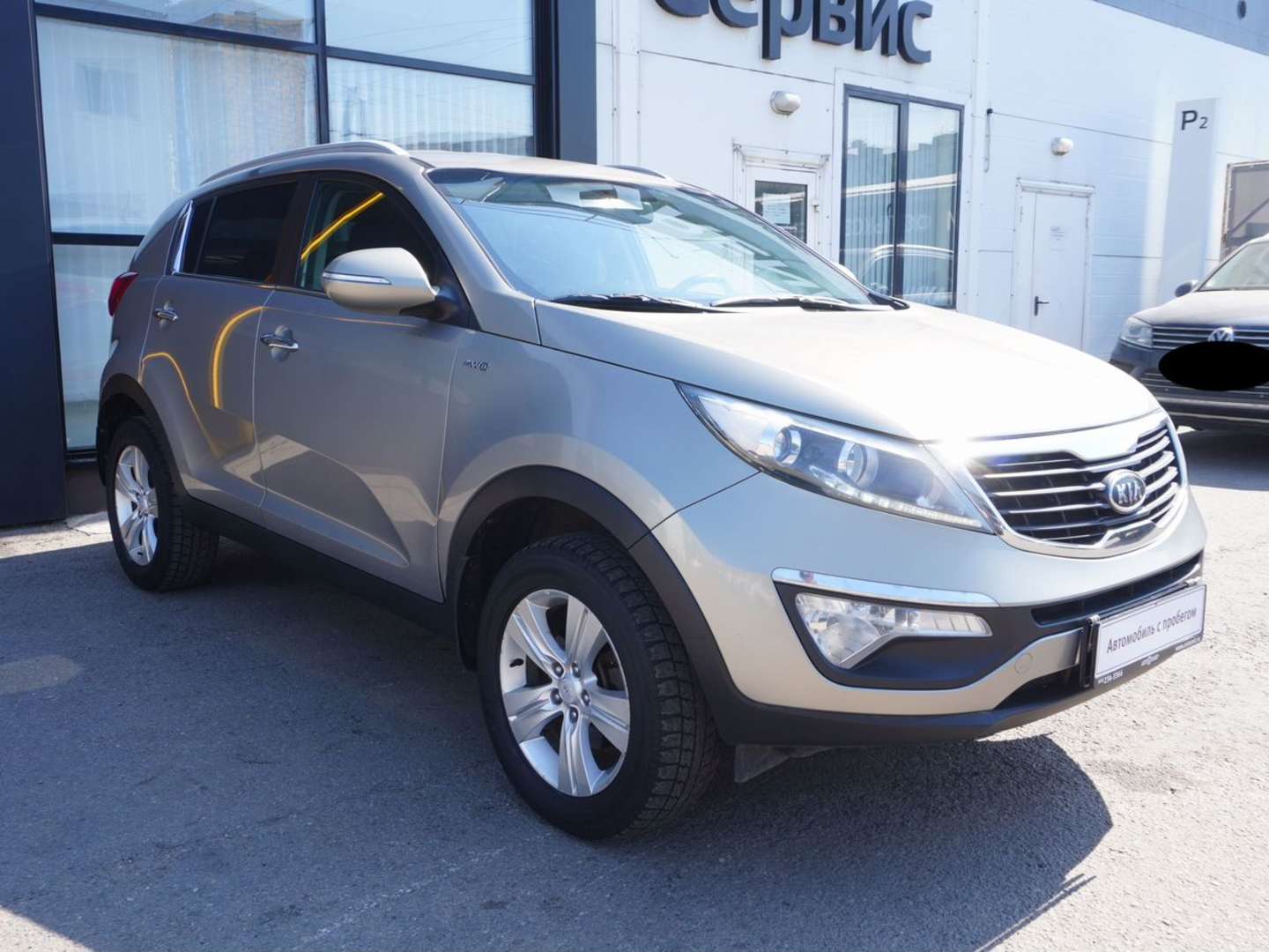Kia Sportage, 2012 — обложка