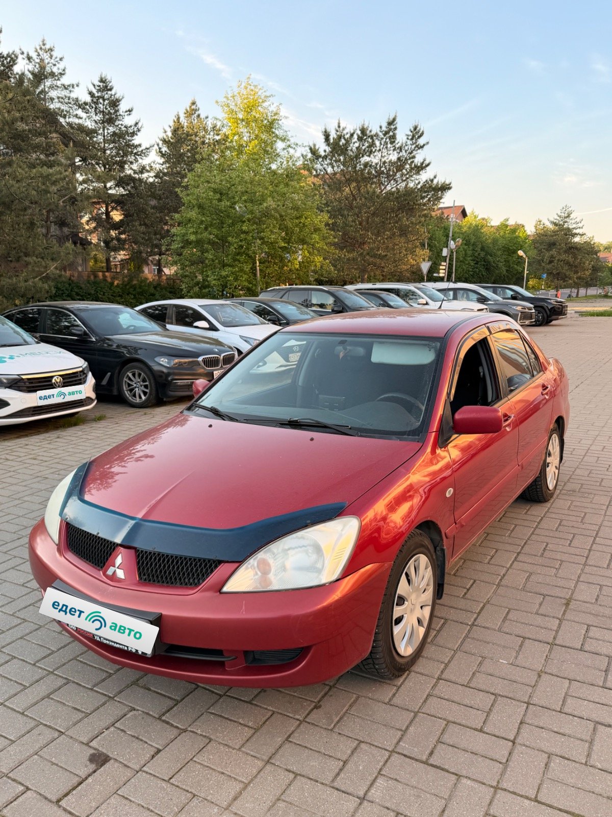 Mitsubishi LANCER, 2009 — обложка