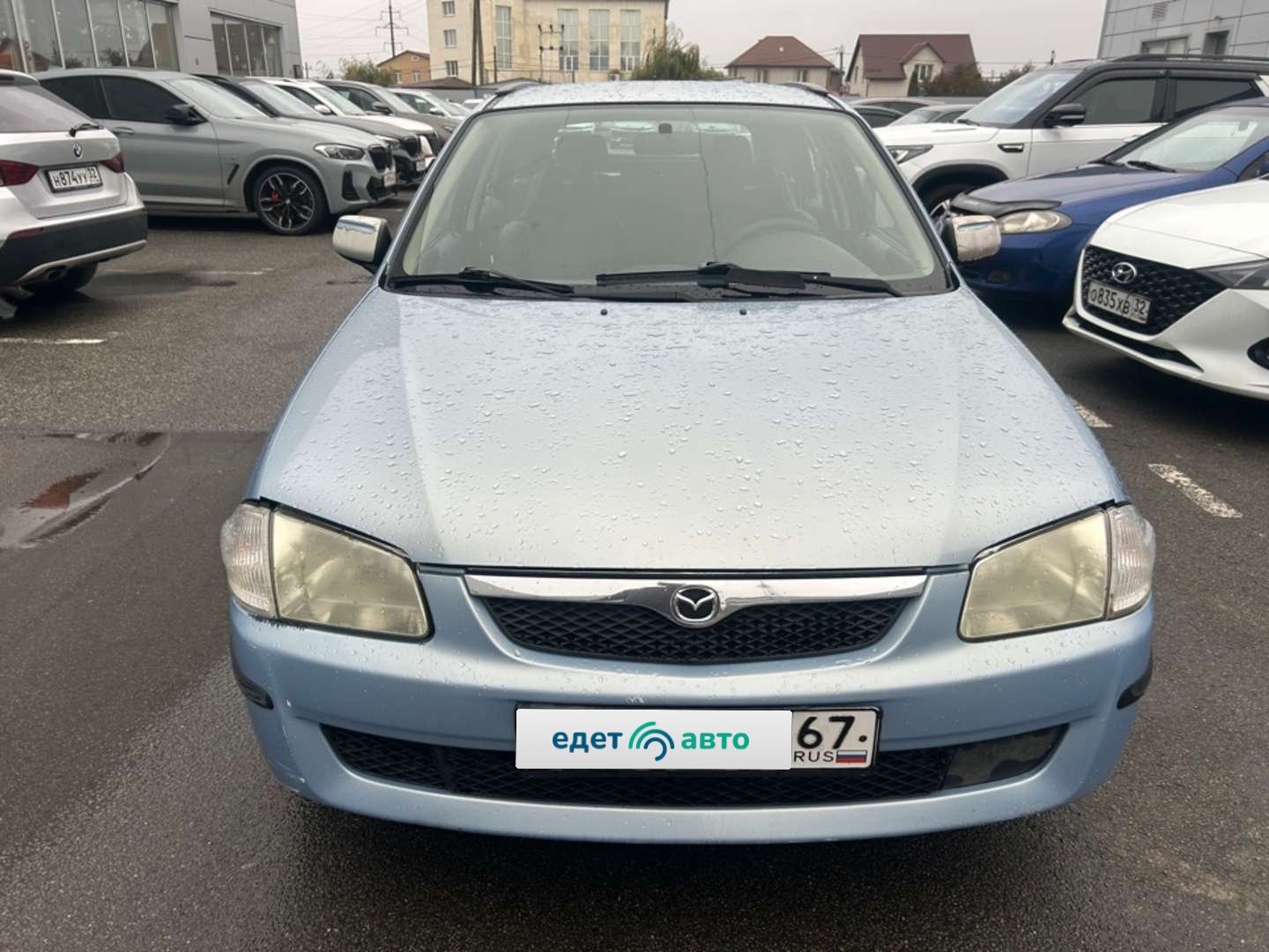 Mazda 323, 1999 — Снаружи